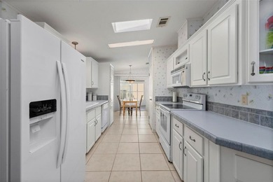 Beautifully maintained and fully furnished 2-bedroom, 2-bath on Kings Gate Golf Club in Florida - for sale on GolfHomes.com, golf home, golf lot