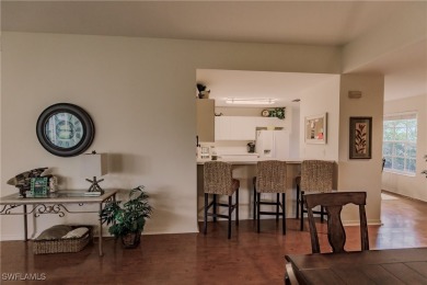 Discover the perfect TURNKEY condo with breathtaking water views on Estero Country Club in Florida - for sale on GolfHomes.com, golf home, golf lot