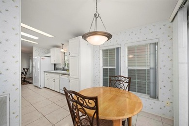 Beautifully maintained and fully furnished 2-bedroom, 2-bath on Kings Gate Golf Club in Florida - for sale on GolfHomes.com, golf home, golf lot