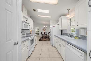 Beautifully maintained and fully furnished 2-bedroom, 2-bath on Kings Gate Golf Club in Florida - for sale on GolfHomes.com, golf home, golf lot