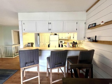 Charming Two-Bedroom, Two-Bath Condo with Scenic Water Views at on The Eagle Pointe Golf Resort in Indiana - for sale on GolfHomes.com, golf home, golf lot
