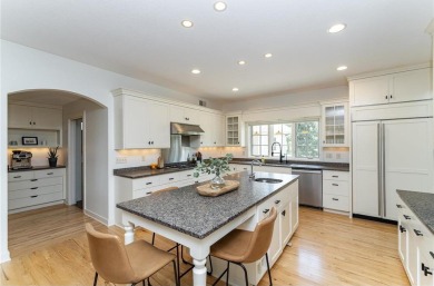 Absolutely stunning ranch-style home with luxury upgrades and on Rochester Golf and Country Club in Minnesota - for sale on GolfHomes.com, golf home, golf lot