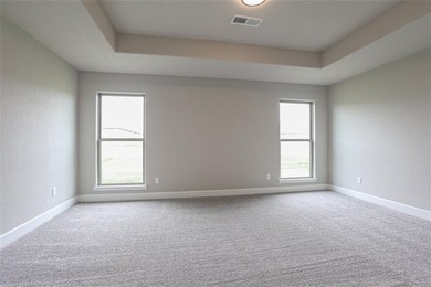 This traditional ranch-style new home is complemented by a on Heritage Park Golf Course in Kansas - for sale on GolfHomes.com, golf home, golf lot