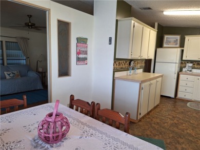 PRICE JUST REDUCED $15,000 - THIS OPEN CONCEPT FLOOR PLAN 1989 on Six Lakes Country Club in Florida - for sale on GolfHomes.com, golf home, golf lot