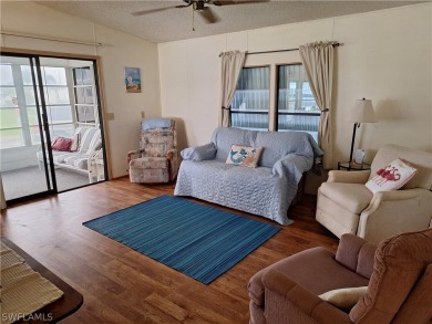 PRICE JUST REDUCED $15,000 - THIS OPEN CONCEPT FLOOR PLAN 1989 on Six Lakes Country Club in Florida - for sale on GolfHomes.com, golf home, golf lot