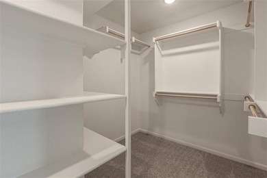 This traditional ranch-style new home is complemented by a on Heritage Park Golf Course in Kansas - for sale on GolfHomes.com, golf home, golf lot