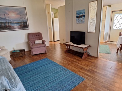 PRICE JUST REDUCED $15,000 - THIS OPEN CONCEPT FLOOR PLAN 1989 on Six Lakes Country Club in Florida - for sale on GolfHomes.com, golf home, golf lot