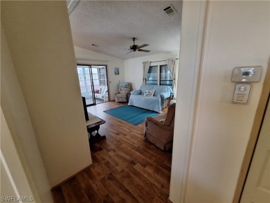 PRICE JUST REDUCED $15,000 - THIS OPEN CONCEPT FLOOR PLAN 1989 on Six Lakes Country Club in Florida - for sale on GolfHomes.com, golf home, golf lot