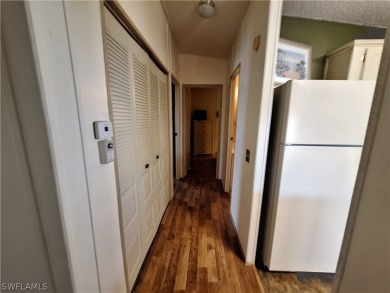PRICE JUST REDUCED $15,000 - THIS OPEN CONCEPT FLOOR PLAN 1989 on Six Lakes Country Club in Florida - for sale on GolfHomes.com, golf home, golf lot