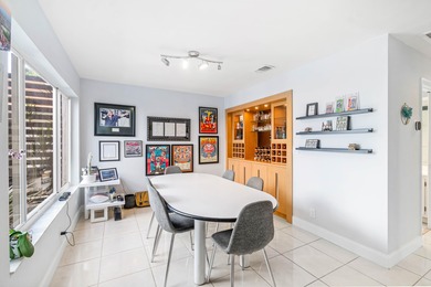 Beautiful golf course views surround this bright and inviting on Indian Spring Golf and Country Club in Florida - for sale on GolfHomes.com, golf home, golf lot