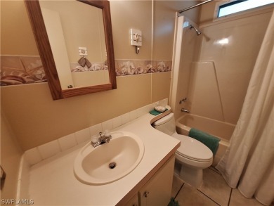 PRICE JUST REDUCED $15,000 - THIS OPEN CONCEPT FLOOR PLAN 1989 on Six Lakes Country Club in Florida - for sale on GolfHomes.com, golf home, golf lot