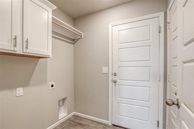 This traditional ranch-style new home is complemented by a on Heritage Park Golf Course in Kansas - for sale on GolfHomes.com, golf home, golf lot