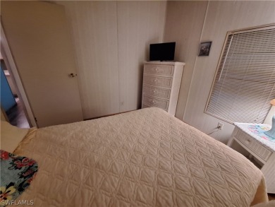 PRICE JUST REDUCED $15,000 - THIS OPEN CONCEPT FLOOR PLAN 1989 on Six Lakes Country Club in Florida - for sale on GolfHomes.com, golf home, golf lot