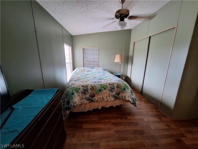 PRICE JUST REDUCED $15,000 - THIS OPEN CONCEPT FLOOR PLAN 1989 on Six Lakes Country Club in Florida - for sale on GolfHomes.com, golf home, golf lot