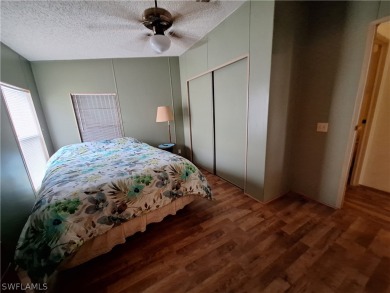 PRICE JUST REDUCED $15,000 - THIS OPEN CONCEPT FLOOR PLAN 1989 on Six Lakes Country Club in Florida - for sale on GolfHomes.com, golf home, golf lot