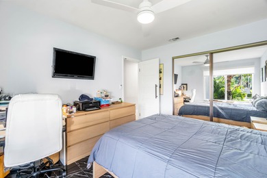 Beautiful golf course views surround this bright and inviting on Indian Spring Golf and Country Club in Florida - for sale on GolfHomes.com, golf home, golf lot