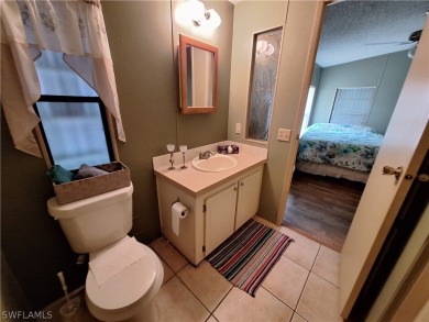 PRICE JUST REDUCED $15,000 - THIS OPEN CONCEPT FLOOR PLAN 1989 on Six Lakes Country Club in Florida - for sale on GolfHomes.com, golf home, golf lot