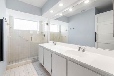 Beautiful golf course views surround this bright and inviting on Indian Spring Golf and Country Club in Florida - for sale on GolfHomes.com, golf home, golf lot