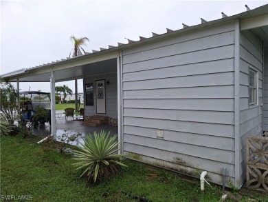 PRICE JUST REDUCED $15,000 - THIS OPEN CONCEPT FLOOR PLAN 1989 on Six Lakes Country Club in Florida - for sale on GolfHomes.com, golf home, golf lot