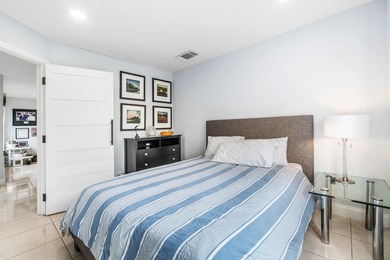 Beautiful golf course views surround this bright and inviting on Indian Spring Golf and Country Club in Florida - for sale on GolfHomes.com, golf home, golf lot