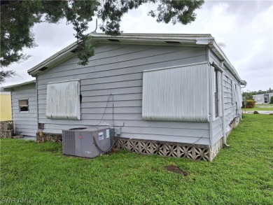 PRICE JUST REDUCED $15,000 - THIS OPEN CONCEPT FLOOR PLAN 1989 on Six Lakes Country Club in Florida - for sale on GolfHomes.com, golf home, golf lot