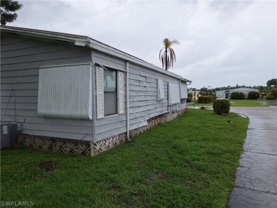 PRICE JUST REDUCED $15,000 - THIS OPEN CONCEPT FLOOR PLAN 1989 on Six Lakes Country Club in Florida - for sale on GolfHomes.com, golf home, golf lot