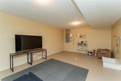 Absolutely stunning ranch-style home with luxury upgrades and on Rochester Golf and Country Club in Minnesota - for sale on GolfHomes.com, golf home, golf lot
