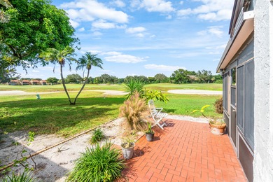 Beautiful golf course views surround this bright and inviting on Indian Spring Golf and Country Club in Florida - for sale on GolfHomes.com, golf home, golf lot