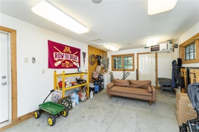 Absolutely stunning ranch-style home with luxury upgrades and on Rochester Golf and Country Club in Minnesota - for sale on GolfHomes.com, golf home, golf lot