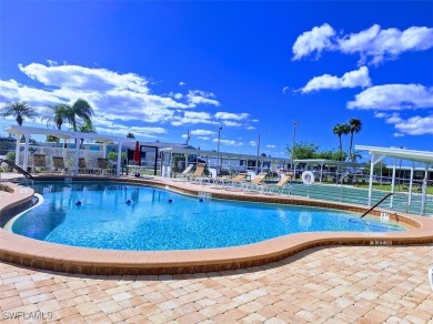 PRICE JUST REDUCED $15,000 - THIS OPEN CONCEPT FLOOR PLAN 1989 on Six Lakes Country Club in Florida - for sale on GolfHomes.com, golf home, golf lot