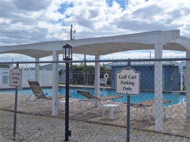 PRICE JUST REDUCED $15,000 - THIS OPEN CONCEPT FLOOR PLAN 1989 on Six Lakes Country Club in Florida - for sale on GolfHomes.com, golf home, golf lot