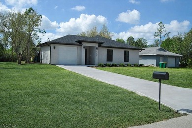 Welcome to this beautifully designed brand-new construction home on Burnt Store Golf Club in Florida - for sale on GolfHomes.com, golf home, golf lot