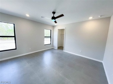 Welcome to this beautifully designed brand-new construction home on Burnt Store Golf Club in Florida - for sale on GolfHomes.com, golf home, golf lot