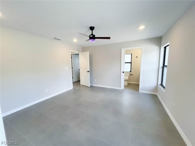 Welcome to this beautifully designed brand-new construction home on Burnt Store Golf Club in Florida - for sale on GolfHomes.com, golf home, golf lot