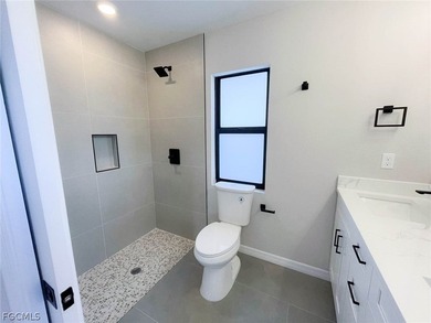 Welcome to this beautifully designed brand-new construction home on Burnt Store Golf Club in Florida - for sale on GolfHomes.com, golf home, golf lot