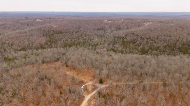 CITY CONVENIENCE MEETS UNRESTRICTED LAND IN CHEROKEE VILLAGEThis on Cherokee Village North Course in Arkansas - for sale on GolfHomes.com, golf home, golf lot