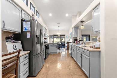 Welcome to this beautifully maintained Tarpon II model, ideally on Summerglen Country Club in Florida - for sale on GolfHomes.com, golf home, golf lot
