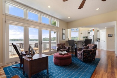 Live the lakefront dream at this exceptional 4-bedroom, 5.5-bath on Lake Mohawk Golf Club in Ohio - for sale on GolfHomes.com, golf home, golf lot