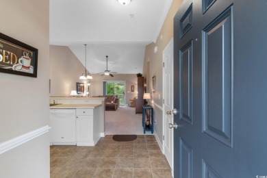 Discover this beautifully maintained top-floor condo nestled in on Barefoot Resort and Golf Club  in South Carolina - for sale on GolfHomes.com, golf home, golf lot