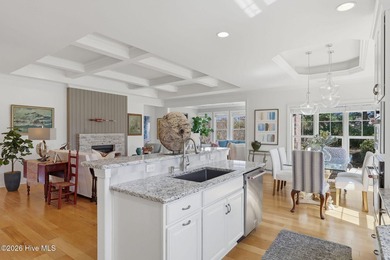 This all-brick home built in 2017 enjoys expansive pond views on Members Club At St. James Plantation in North Carolina - for sale on GolfHomes.com, golf home, golf lot