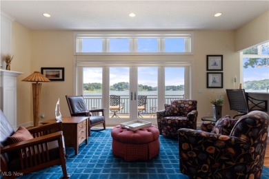 Live the lakefront dream at this exceptional 4-bedroom, 5.5-bath on Lake Mohawk Golf Club in Ohio - for sale on GolfHomes.com, golf home, golf lot