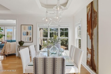 This all-brick home built in 2017 enjoys expansive pond views on Members Club At St. James Plantation in North Carolina - for sale on GolfHomes.com, golf home, golf lot