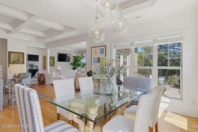 This all-brick home built in 2017 enjoys expansive pond views on Members Club At St. James Plantation in North Carolina - for sale on GolfHomes.com, golf home, golf lot