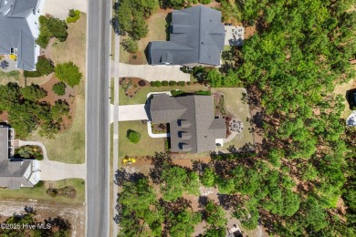 Welcome to this stunning, nearly-new home nestled in the on Members Club At St. James Plantation in North Carolina - for sale on GolfHomes.com, golf home, golf lot