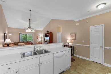 Discover this beautifully maintained top-floor condo nestled in on Barefoot Resort and Golf Club  in South Carolina - for sale on GolfHomes.com, golf home, golf lot