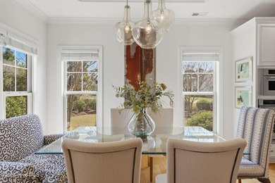 This all-brick home built in 2017 enjoys expansive pond views on Members Club At St. James Plantation in North Carolina - for sale on GolfHomes.com, golf home, golf lot