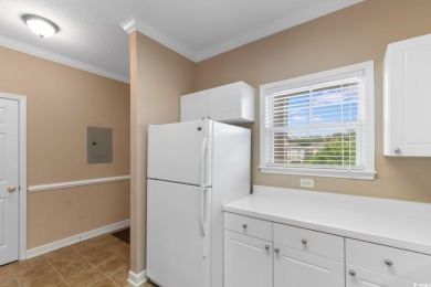 Discover this beautifully maintained top-floor condo nestled in on Barefoot Resort and Golf Club  in South Carolina - for sale on GolfHomes.com, golf home, golf lot