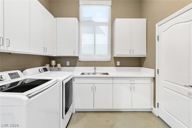 Among Summerlin's most distinguished addresses, this TPC Canyon on Badlands Golf Club in Nevada - for sale on GolfHomes.com, golf home, golf lot