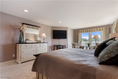 Live the lakefront dream at this exceptional 4-bedroom, 5.5-bath on Lake Mohawk Golf Club in Ohio - for sale on GolfHomes.com, golf home, golf lot