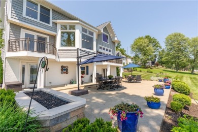 Live the lakefront dream at this exceptional 4-bedroom, 5.5-bath on Lake Mohawk Golf Club in Ohio - for sale on GolfHomes.com, golf home, golf lot